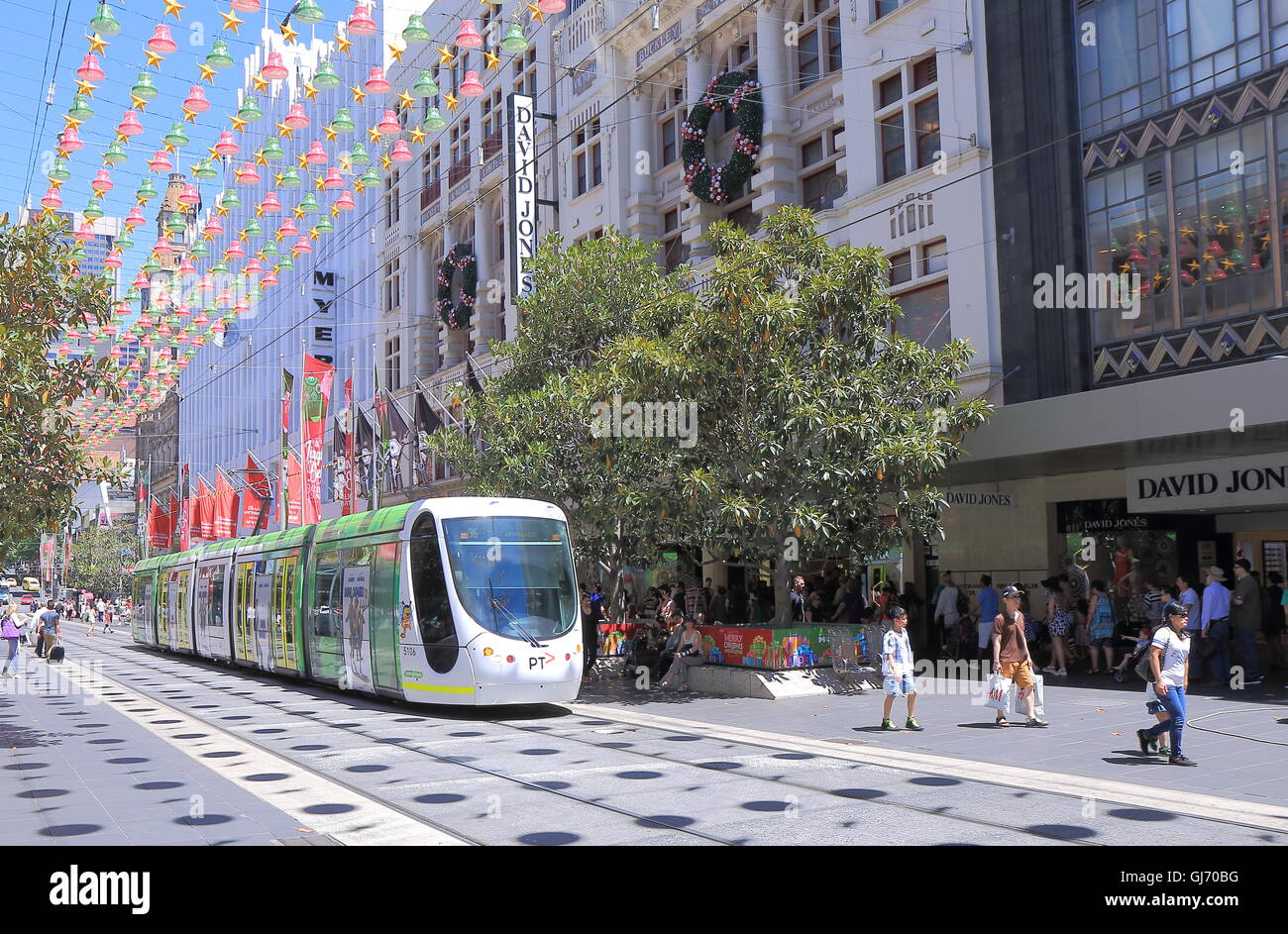 Melbourne modern tram run through Burke St Melbourne shopping area Stock Photo