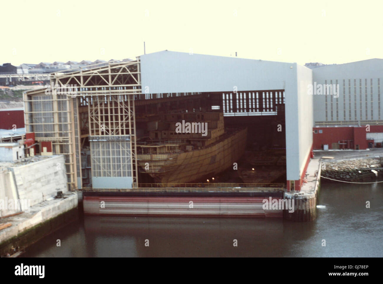 White sky evening view, from Queen Alexandra Bridge, towards two brown