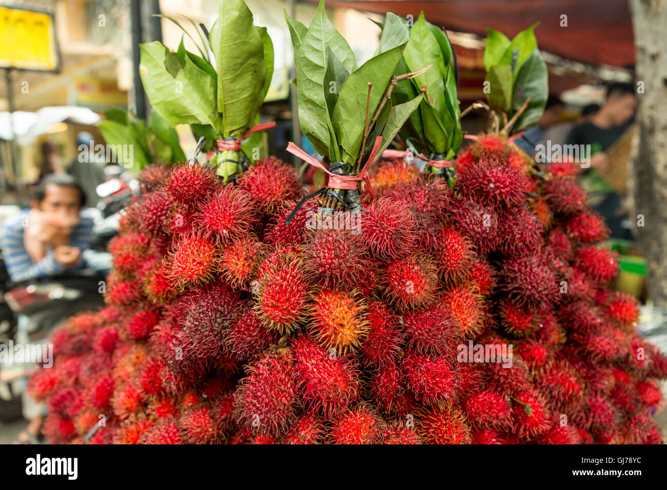 fresh rambutan fruit, lychee fruit on market, Jakarta. Indonesia Stock Photo