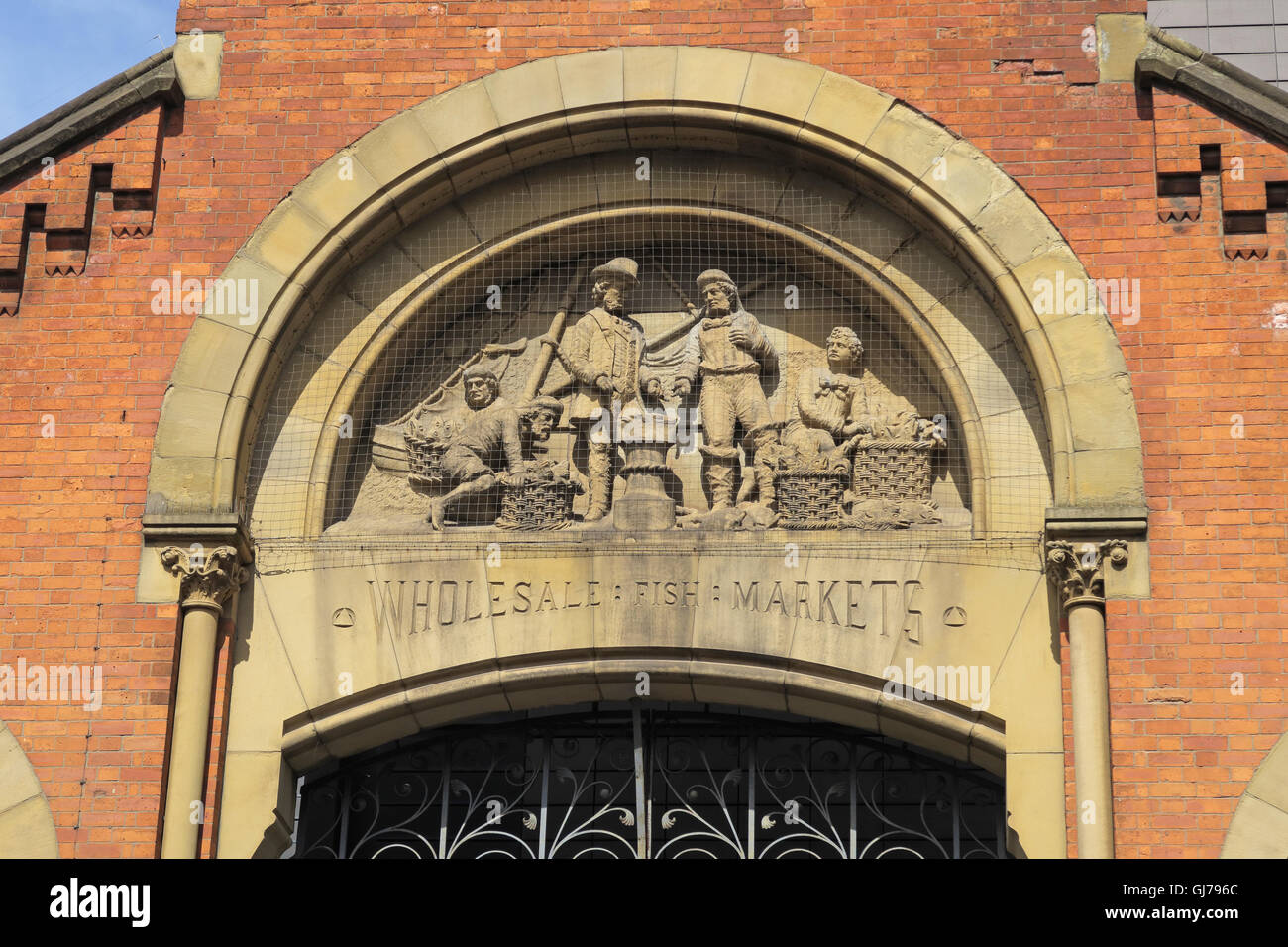 Smithfield old fish Markets sculpted figures,Manchester city centre, England,UK Stock Photo