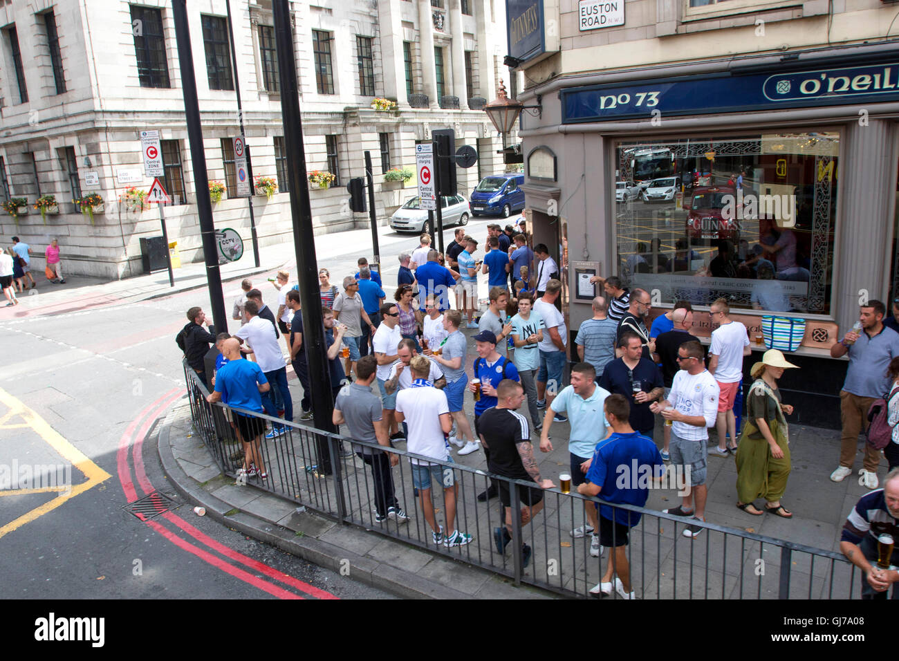 Leicester City football fans drinking in pub outside on Euston Road in Central London 7th August 2016 before FA Community Shield Stock Photo
