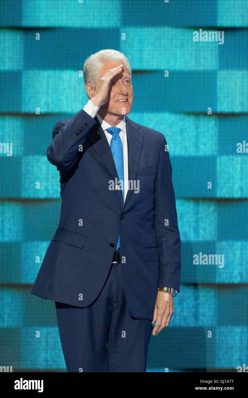 Former President Bill Clinton walks on stage for his keynote address at the 2nd day of the Democratic National Convention at the Wells Fargo Center July 26, 2016 in Philadelphia, Pennsylvania. Stock Photo