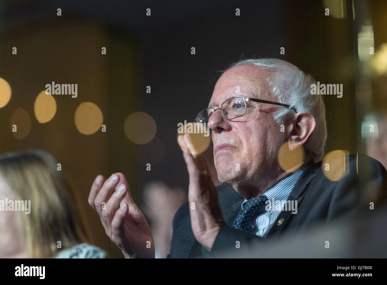 Senator Bernie Sanders watches the roll call vote during the 2nd day of the Democratic National Convention at the Wells Fargo Center July 26, 2016 in Philadelphia, Pennsylvania. Stock Photo