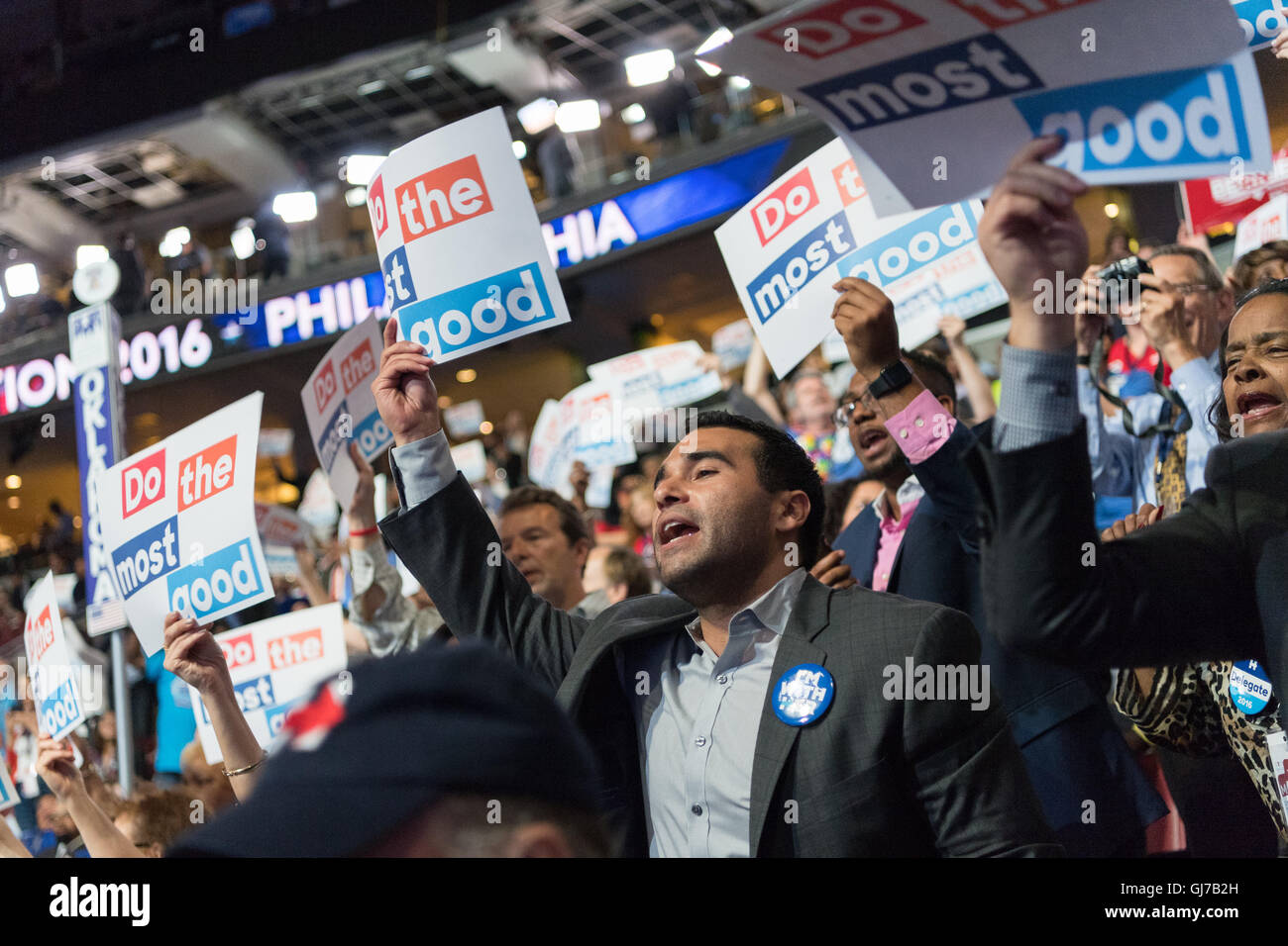 Delegates cheers for Hillary Rodham Clinton during the roll call vote during the 2nd day of the Democratic National Convention at the Wells Fargo Center July 26, 2016 in Philadelphia, Pennsylvania. Stock Photo