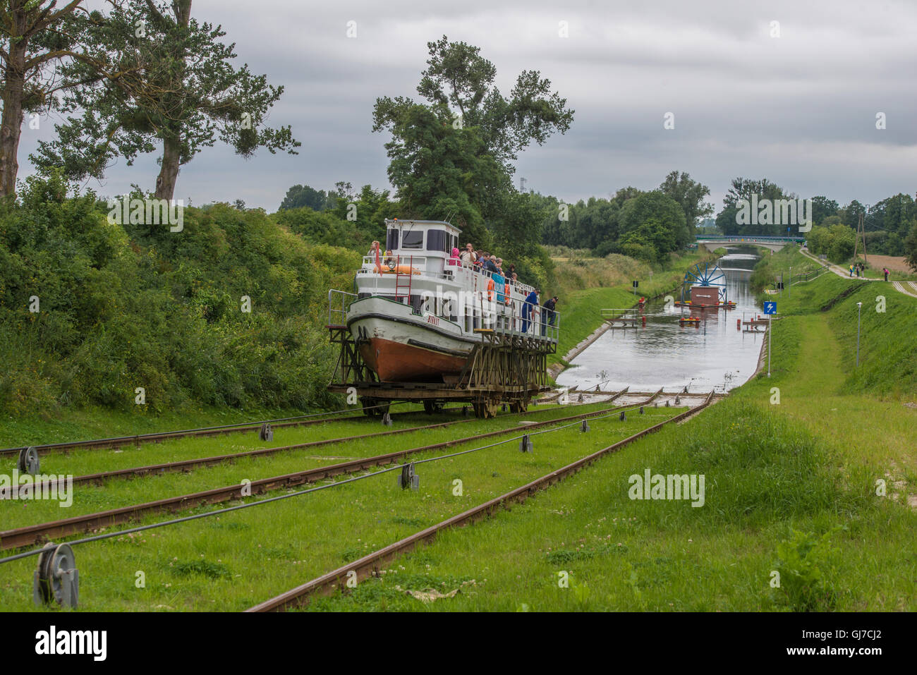 Tourist boat being boat transported on one of the four inclined planes of the Elblag Canal from one water level to the next. Stock Photo