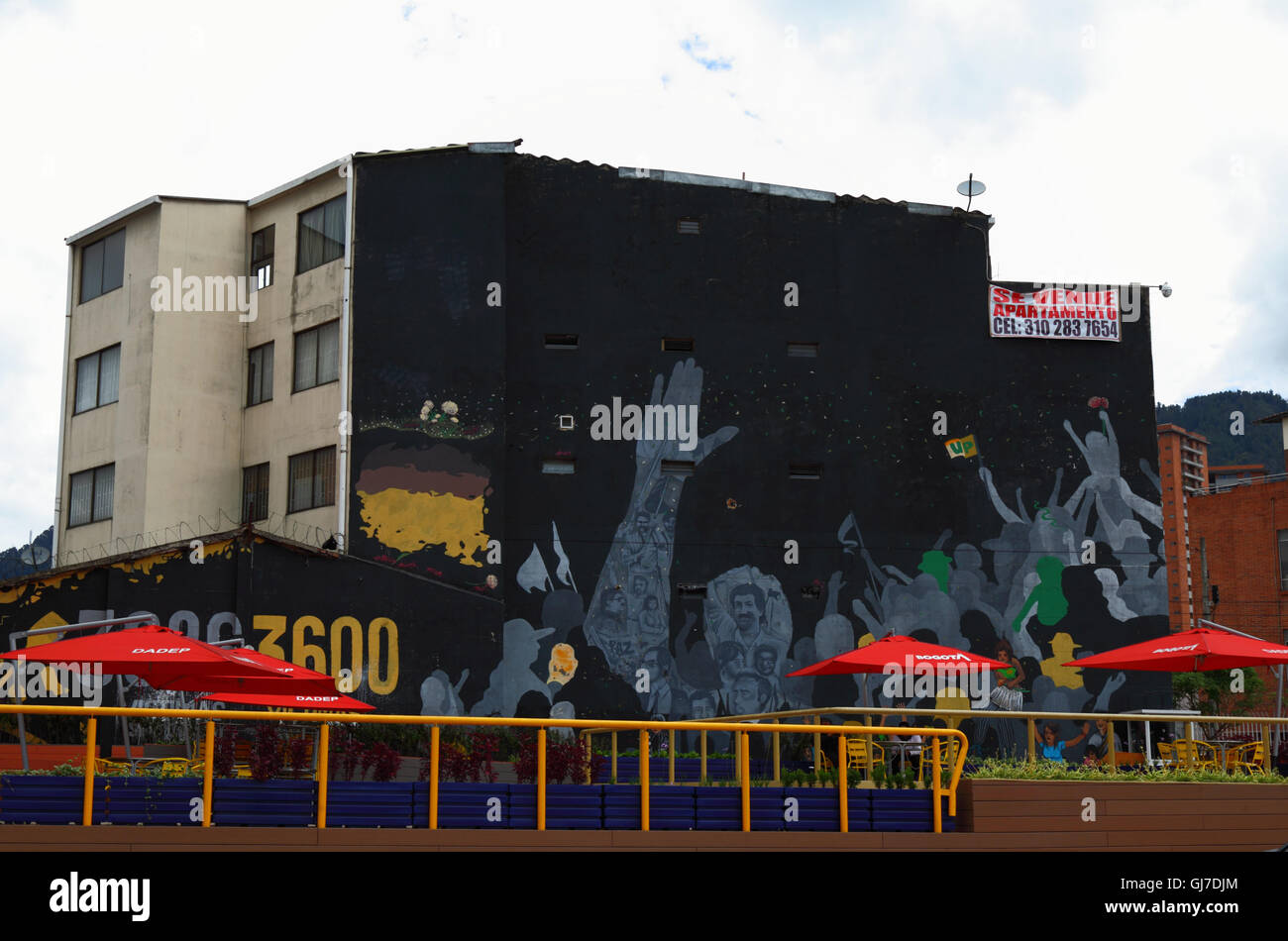 Political mural on wall of apartment building that is for sale, Bogotá, Colombia, Stock Photo