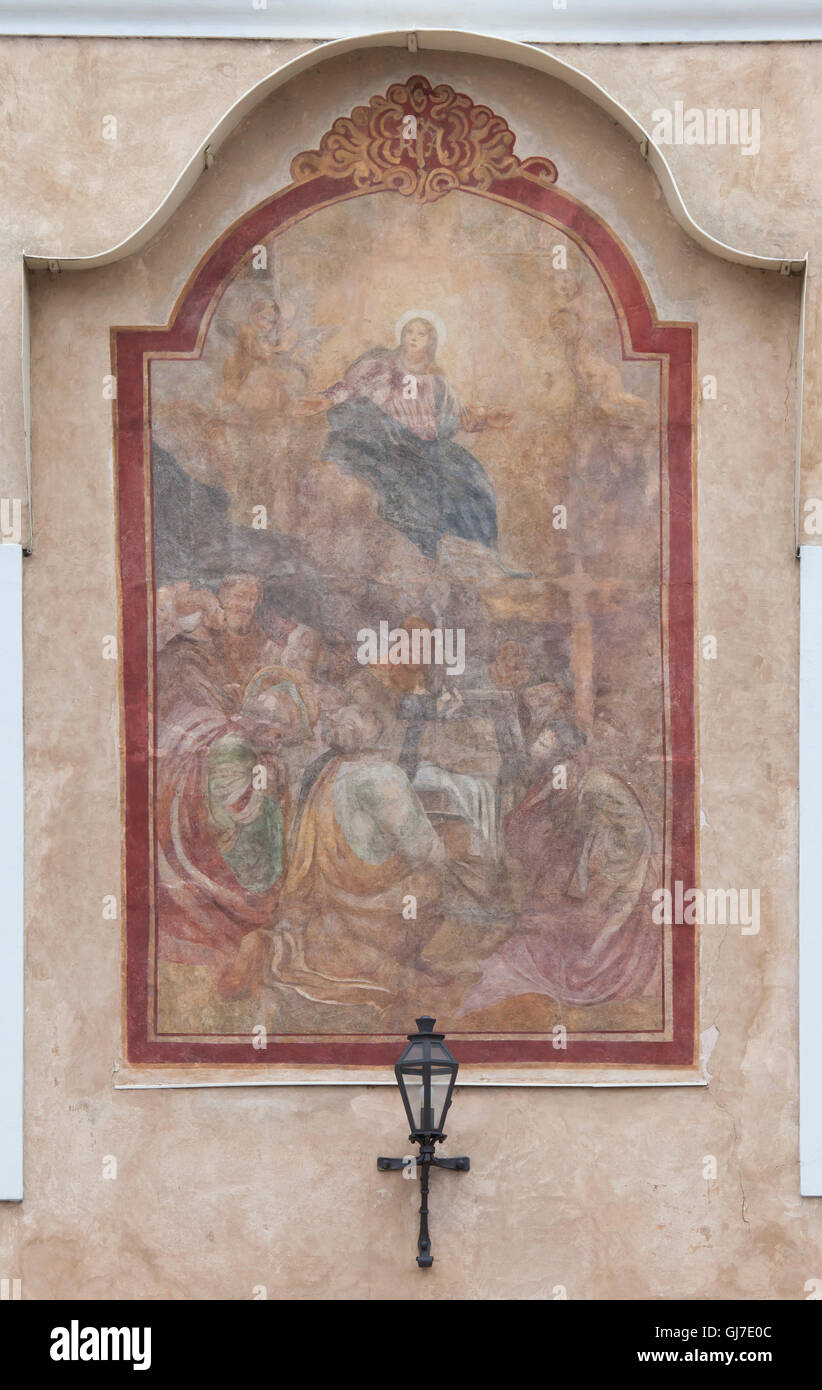Assumption of the Virgin Mary into Heaven depicted on the Tyn School in the Old Town Square in Prague, Czech Republic. Stock Photo