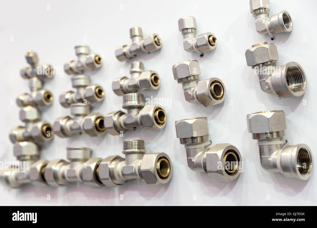 Set of pipe fittings and fixturing components Stock Photo