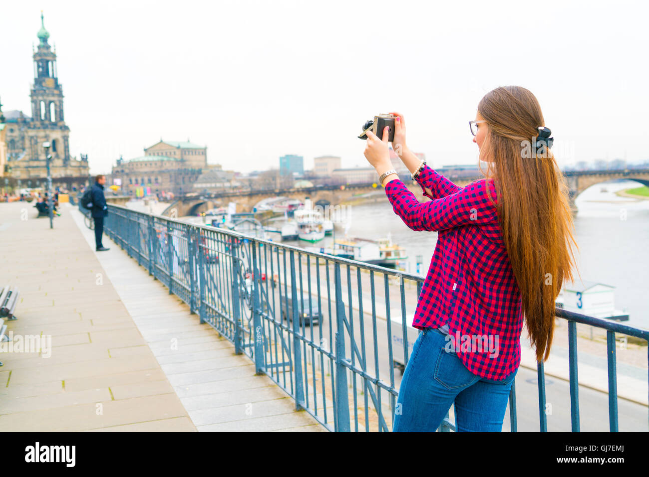Woman tourist photographed retro camera historic part of the city, Dresden, Germany Stock Photo