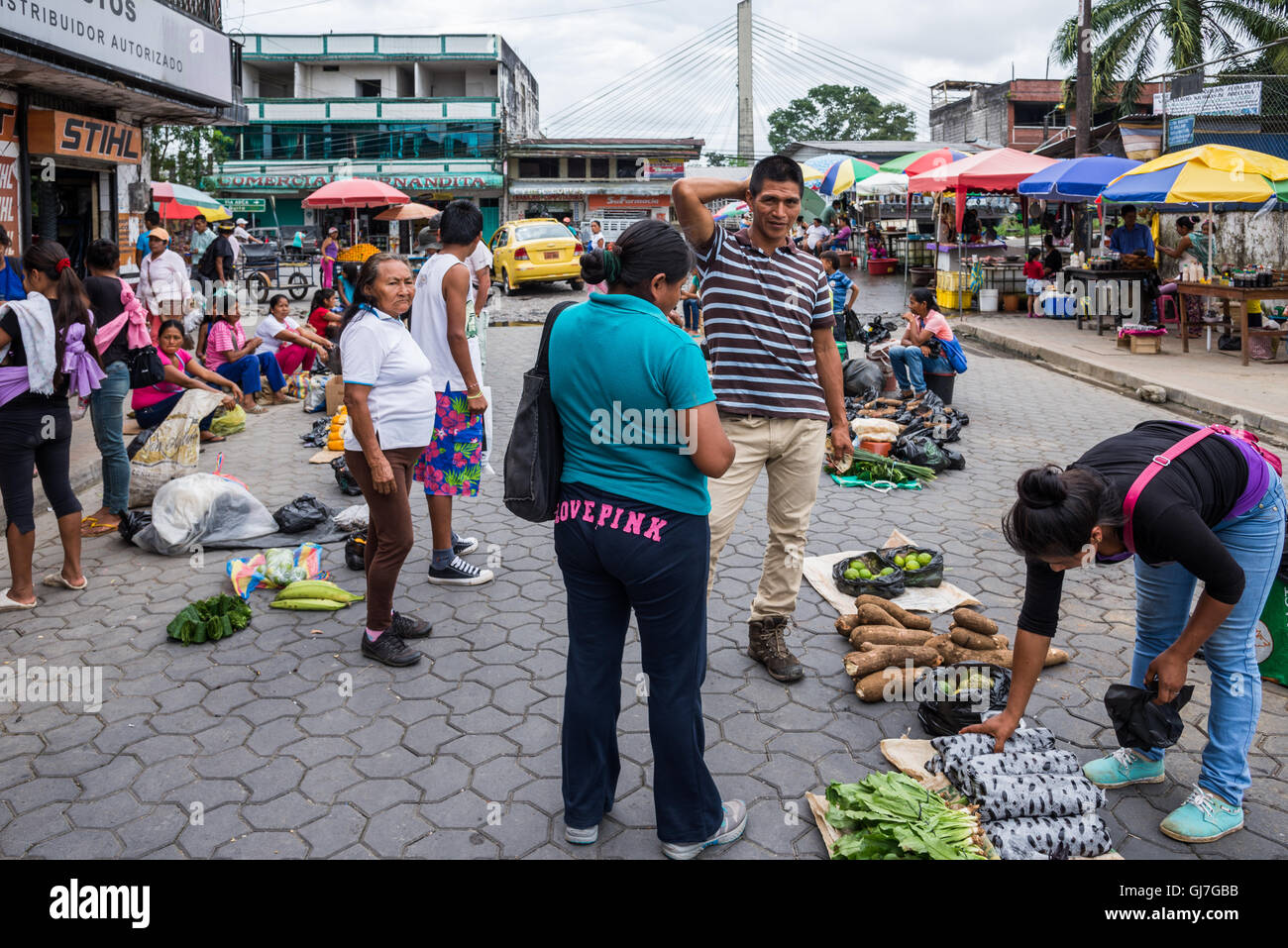 Local people shop for produce at a market in Coca, the gateway city to the Amazons. Ecuador, South America. Stock Photo
