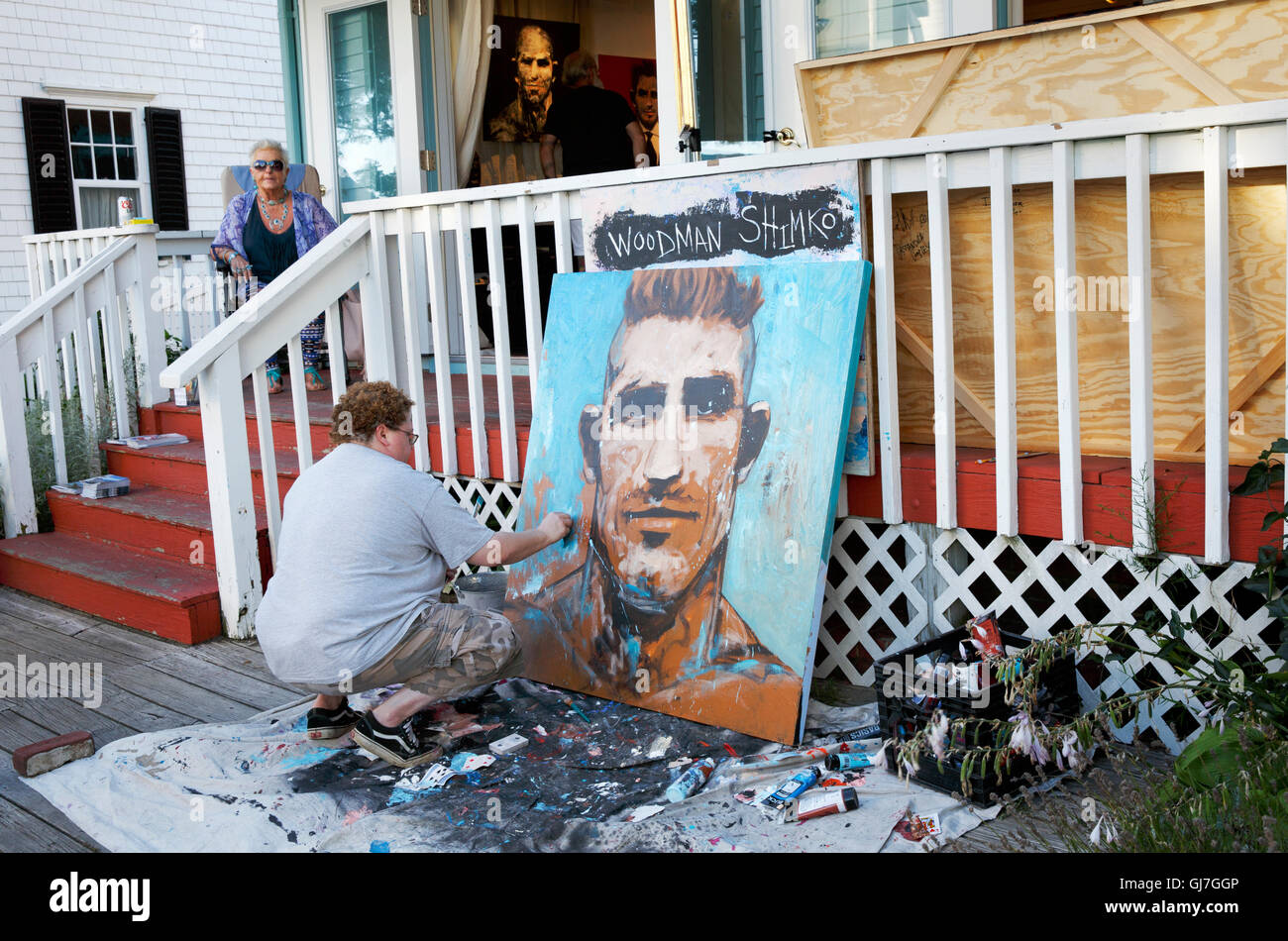 Artist at work outside a gallery, Provincetown, Cape Cod, Massachusetts Stock Photo