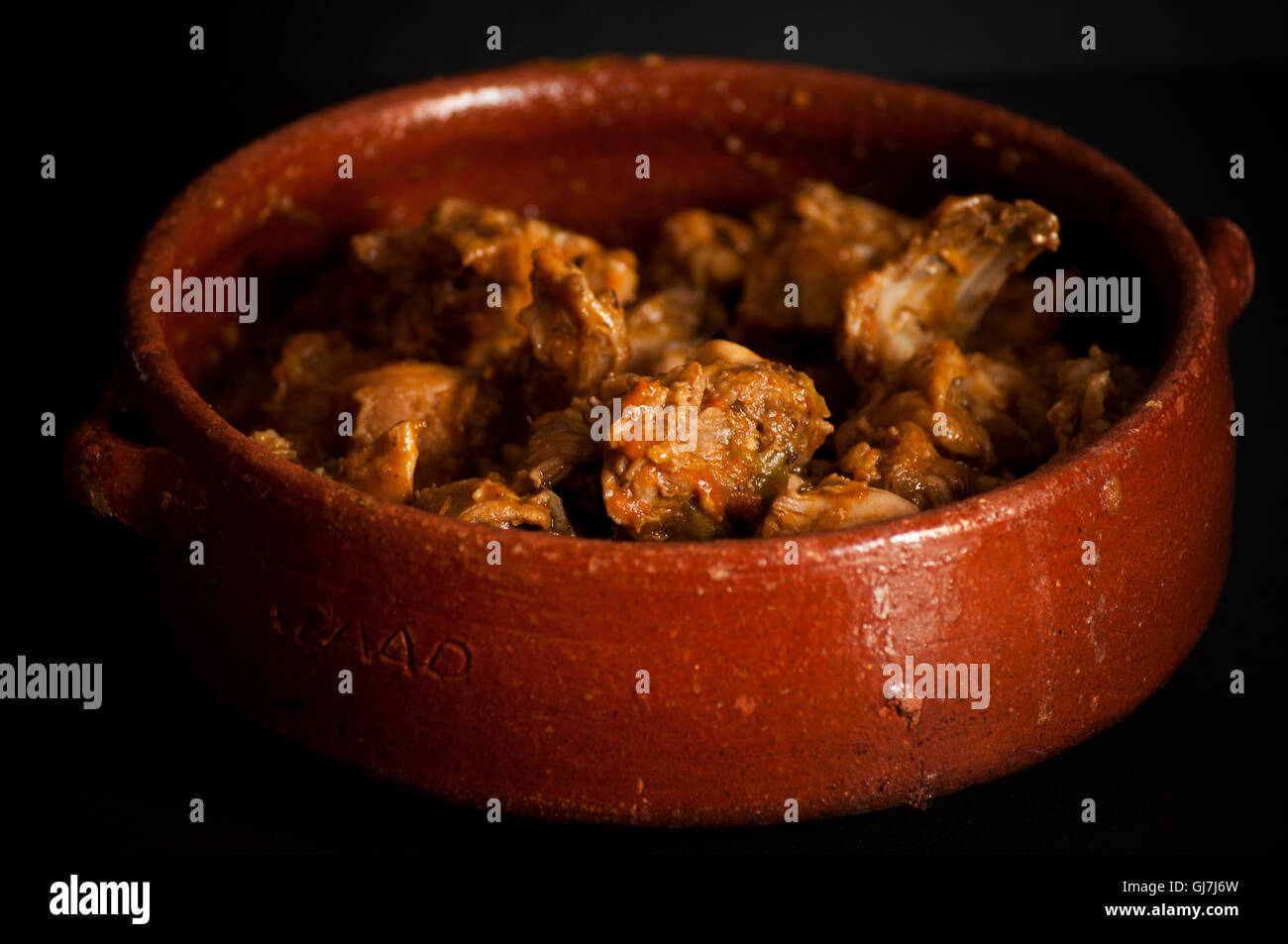 A baked rabbit cooked in a traditional way Stock Photo