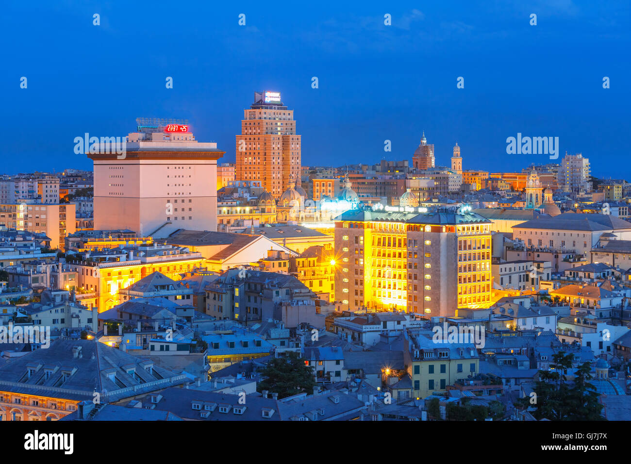 Old town and port of Genoa at night, Italy. Stock Photo