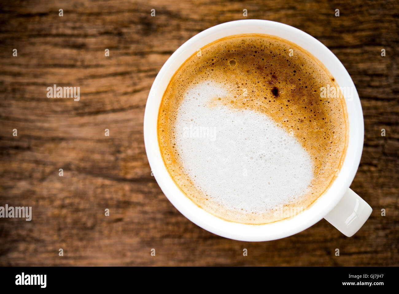 top view of coffee cup on wooden table Stock Photo