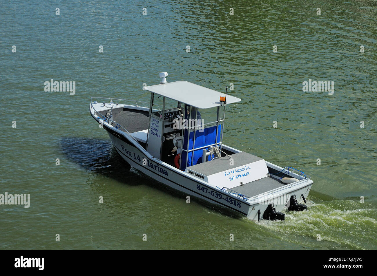 Marina tow boat on the Fox River in Northern Illinois, USA Stock Photo