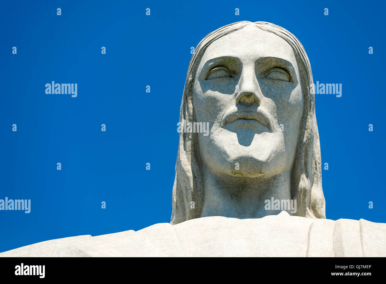 RIO DE JANEIRO - MARCH 21, 2016: The face of the statue of Christ the Redeemer, one of the most recognizable landmarks in Rio. Stock Photo