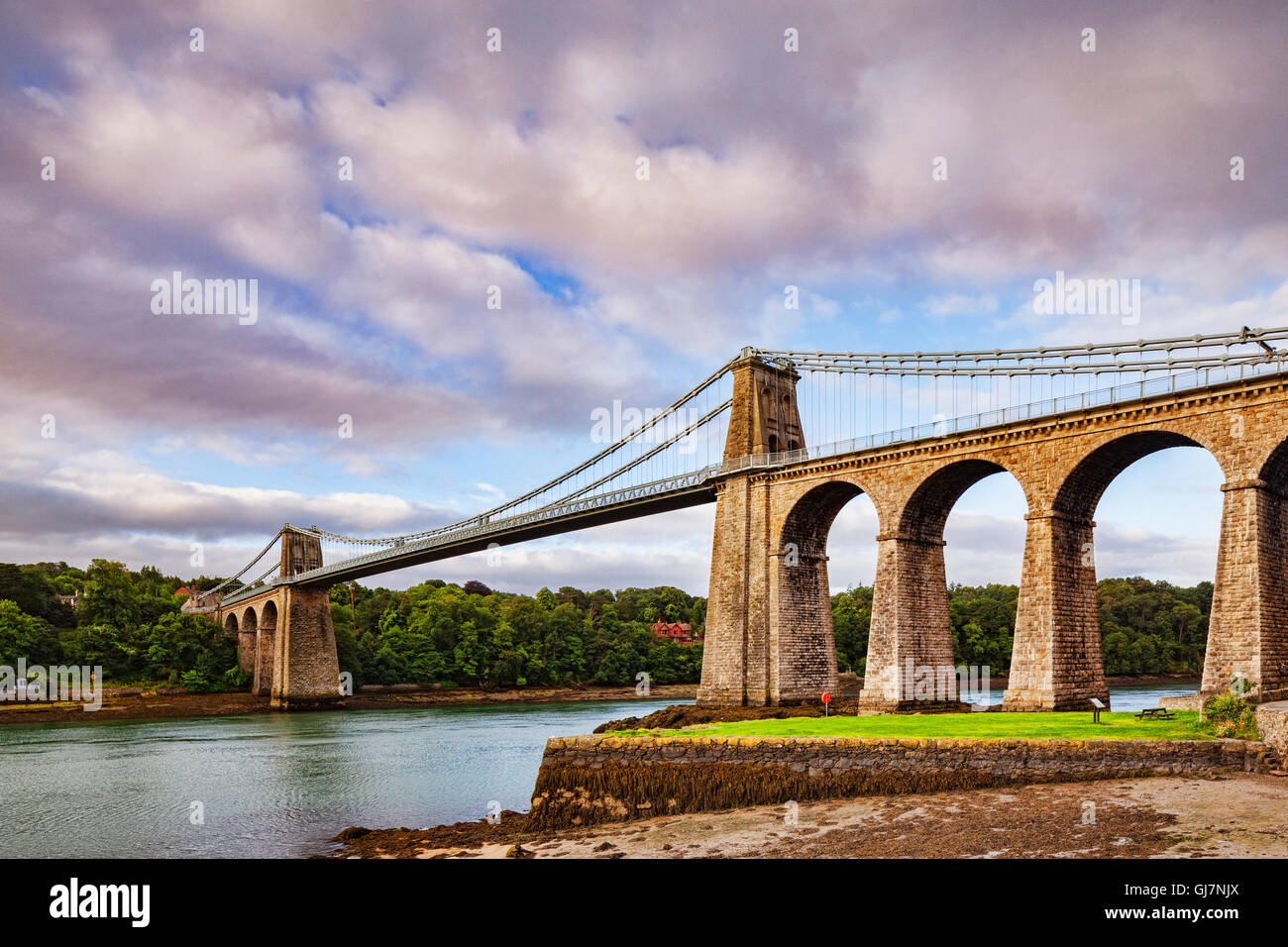 Menai Bridge, crossing the Menai Straits, designed by Thomas Telford, Anglesey, Wales, UK Stock Photo