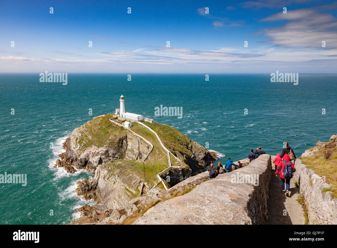 Tourists at South Stack Lighthouse, Anglesey, Wales, UK Stock Photo