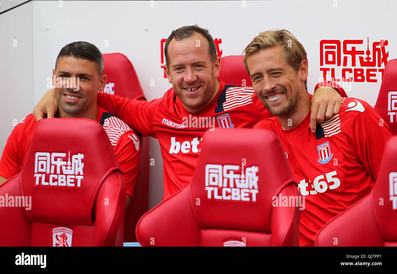 (left to right) Stoke City's Jonathan Walters, Glenn Whelan and Peter Crouch on the bench during the Premier League match at the Riverside Stadium, Middlesbrough. PRESS ASSOCIATION Photo. Picture date: Saturday August 13, 2016. See PA story SOCCER Middlesbrough. Photo credit should read: Richard Sellers/PA Wire. RESTRICTIONS: No use with unauthorised audio, video, data, fixture lists, club/league logos or 'live' services. Online in-match use limited to 75 images, no video emulation. No use in betting, games or single club/league/player publications.- Se Stock Photo