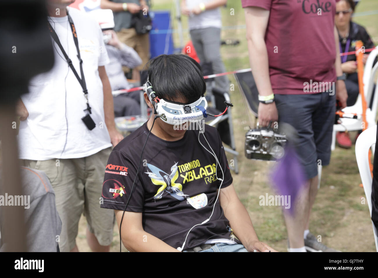 Drone Racing Queen's Cup 2016. Pilot Chi Lau during a race at the UK drone racing competition. Stock Photo