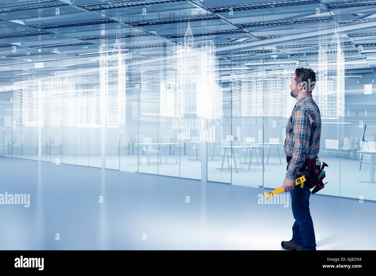 Builder man with level mixed media hi-res stock photography and images ...