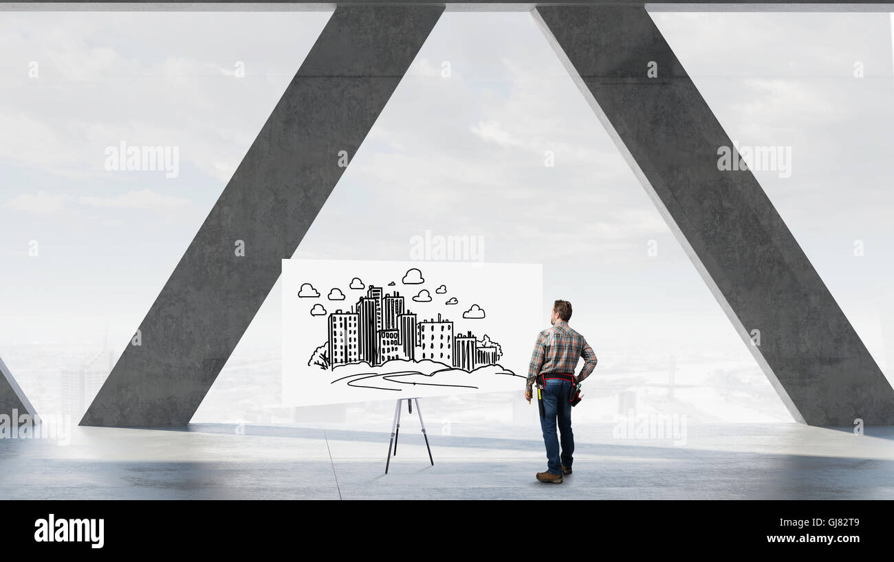 Builder man with level mixed media hi-res stock photography and images ...