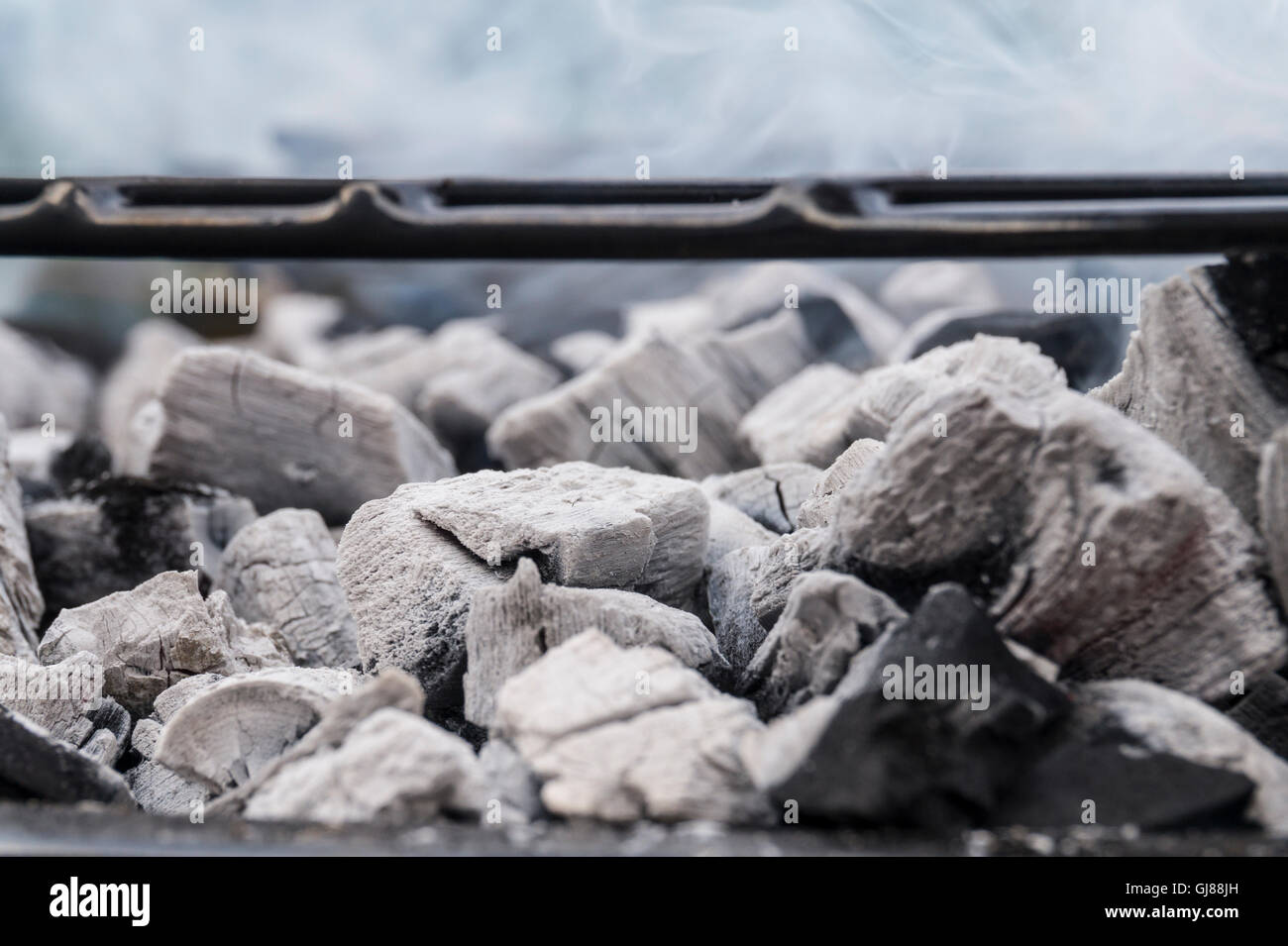 charcoal burning on a barbecue Stock Photo