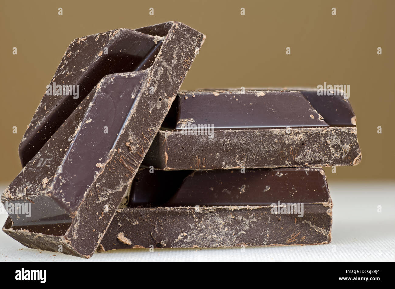 Rich healthy dark chocolate to be eaten fresh or used in baking. Stock Photo