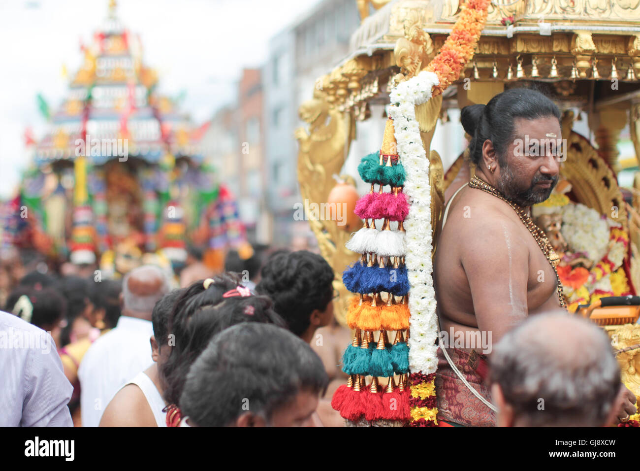 Ealing, London, UK. 14th Aug, 2016. Views of a chariot procession which is the culmination of the annual Shri Kanagathurkkai Amman Temple (SKAT) festival of Thaipusam in West Ealing. The festival attracts thousands of Hindu devotees to West Ealing from all over the world. Credit:  Roger Garfield/Alamy Live News Stock Photo