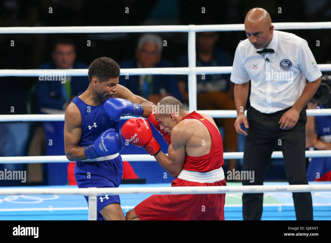 Rio De Janeiro, Rio de Janeiro, Brazil. 14th Aug, 2016. RJ - OLYMPICS/BOXING - SPORTS - The American boxer Shakur Stevenson (blue) won the Brazilian boxer RobenÃlson Vieira (red) at Olympic Games Rio 2016 category (56 kg), at Riocentro on Sunday Credit:  Geraldo Bubniak/ZUMA Wire/Alamy Live News Stock Photo