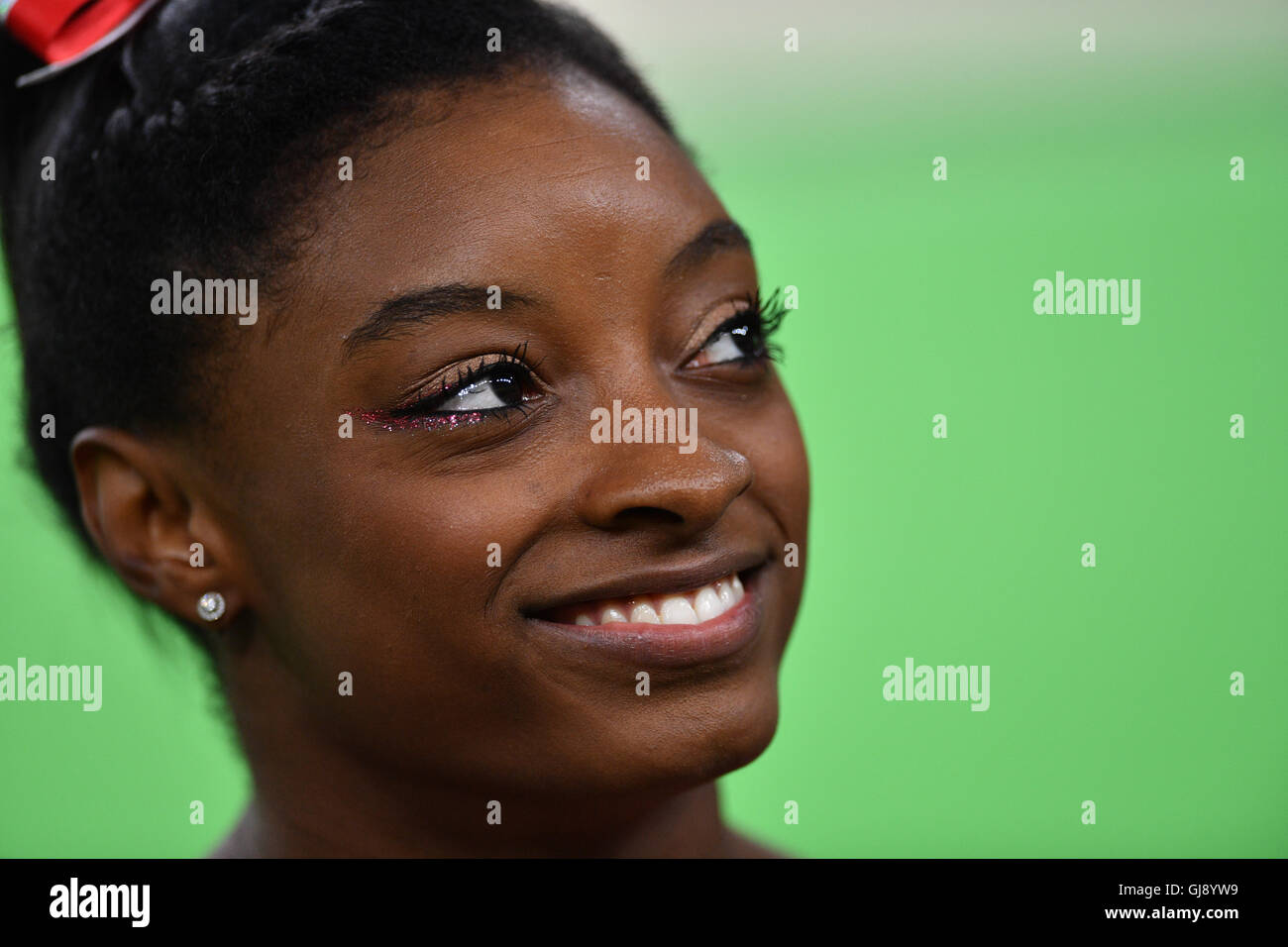 Rio de Janeiro, Brazil. 14th Aug, 2016. Simone Biles of the USA smiles during the Women's Vault Final at the Artistic Gymnastics events of the Rio 2016 Olympic Games at the Rio Olympic Arena in Rio de Janeiro, Brazil, 14 August 2016. Biles won the Gold medal. Photo: Lukas Schulze/dpa/Alamy Live News Stock Photo