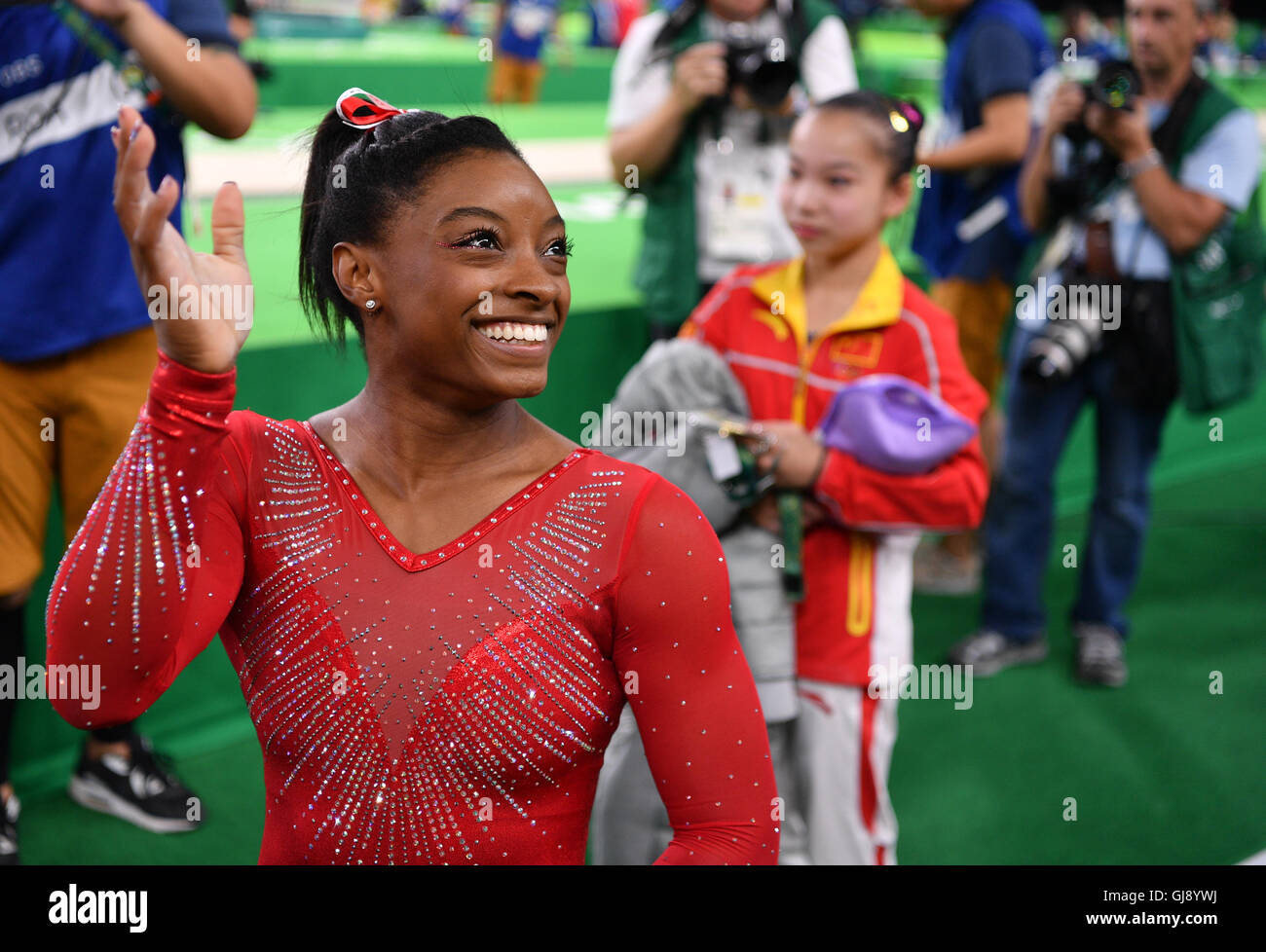 Rio de Janeiro, Brazil. 14th Aug, 2016. Simone Biles of the USA smiles during the Women's Vault Final at the Artistic Gymnastics events of the Rio 2016 Olympic Games at the Rio Olympic Arena in Rio de Janeiro, Brazil, 14 August 2016. Biles won the Gold medal. Photo: Lukas Schulze/dpa/Alamy Live News Stock Photo
