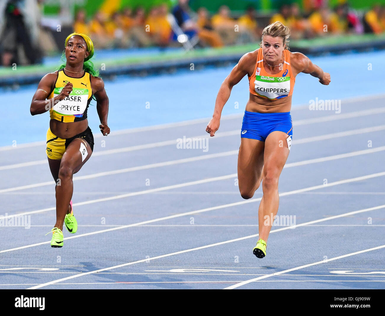 RIO DE JANEIRO, BRAZIL - AUGUST 13: Shelley-Ann Fraser-Pryce of Jamaica and Dafne  Schippers of The Netherlands in the semi final of the women's 100m during  the evening session on Day 8