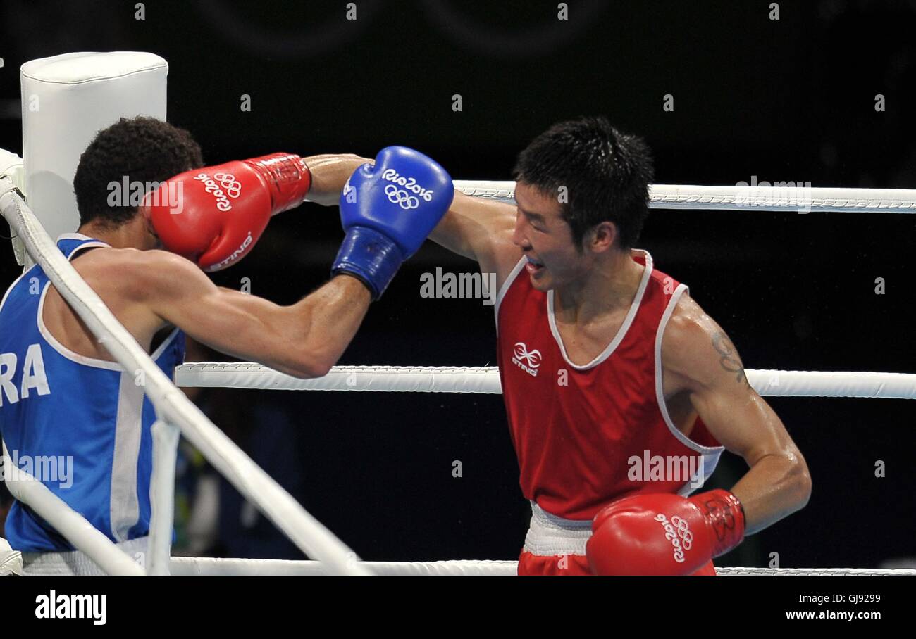 Otgondalai Dorjnyambuu (MGL, red) and Sofiane Oumiha (FRA). Boxing. Riocentro 6. Olympic park. Rio de Janeiro. Brazil. 14/08/2016. Stock Photo