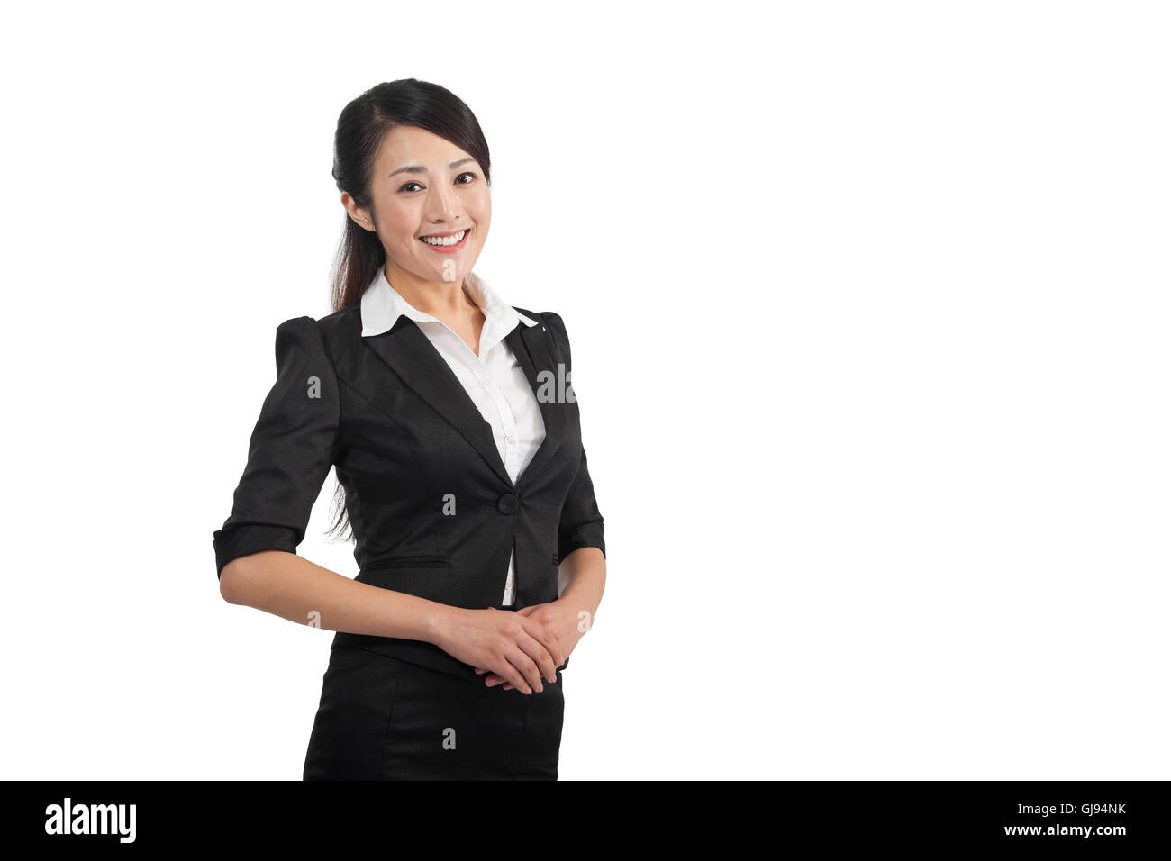 Business lady standing studio shot Stock Photo - Alamy