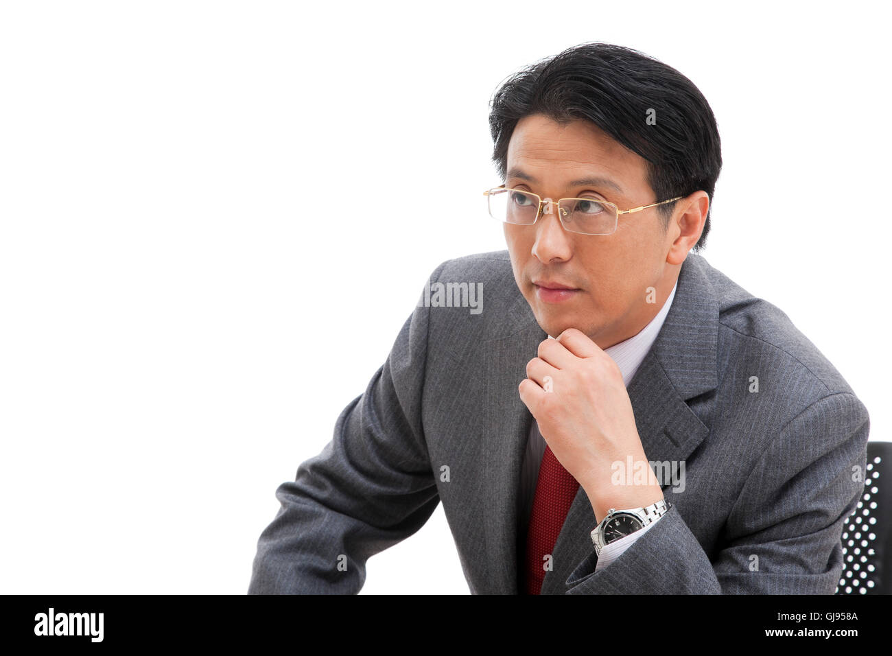 Pensive middle aged chinese man hi-res stock photography and images - Alamy