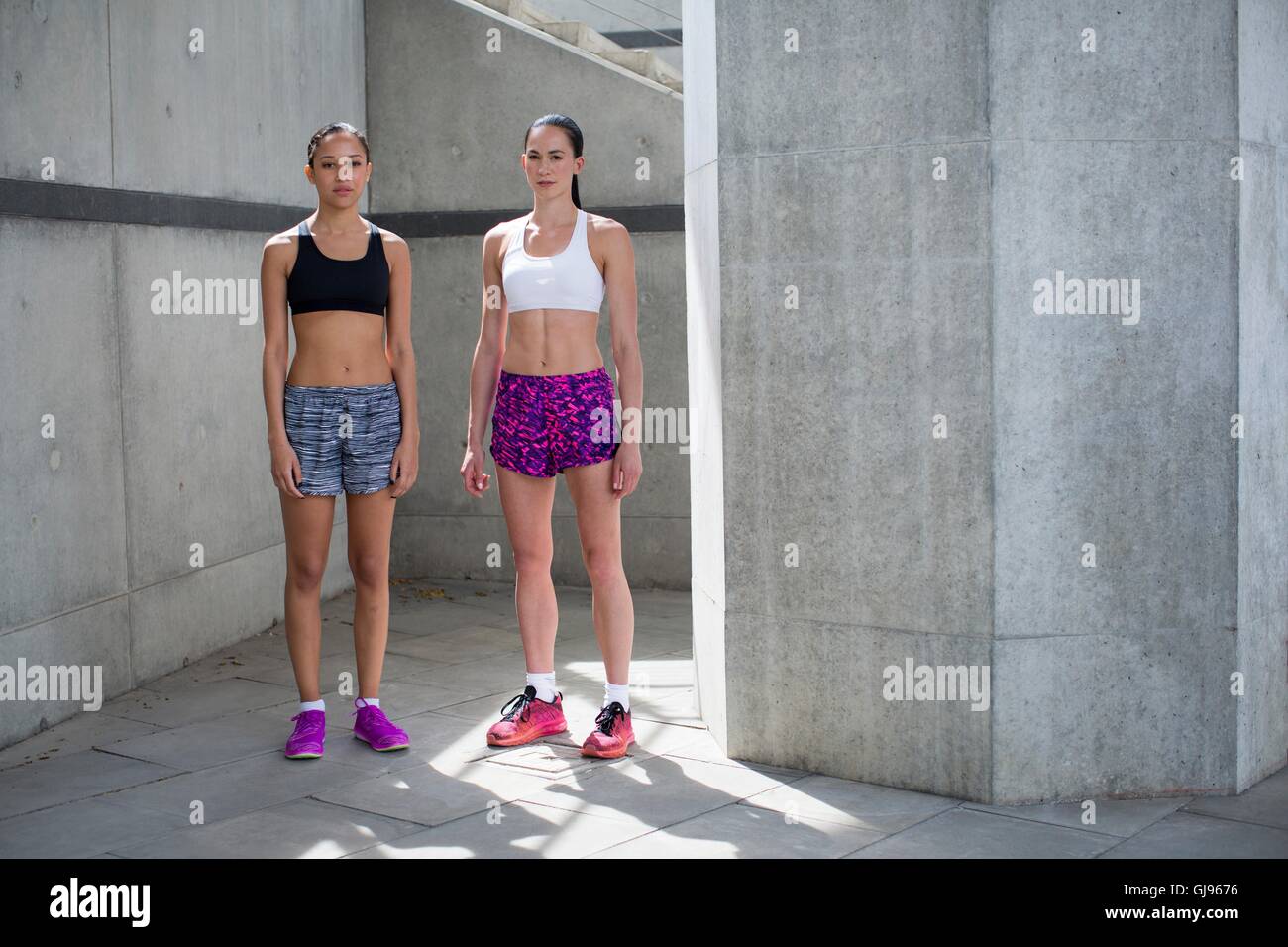 MODEL RELEASED. Two young women in sports wear. Stock Photo