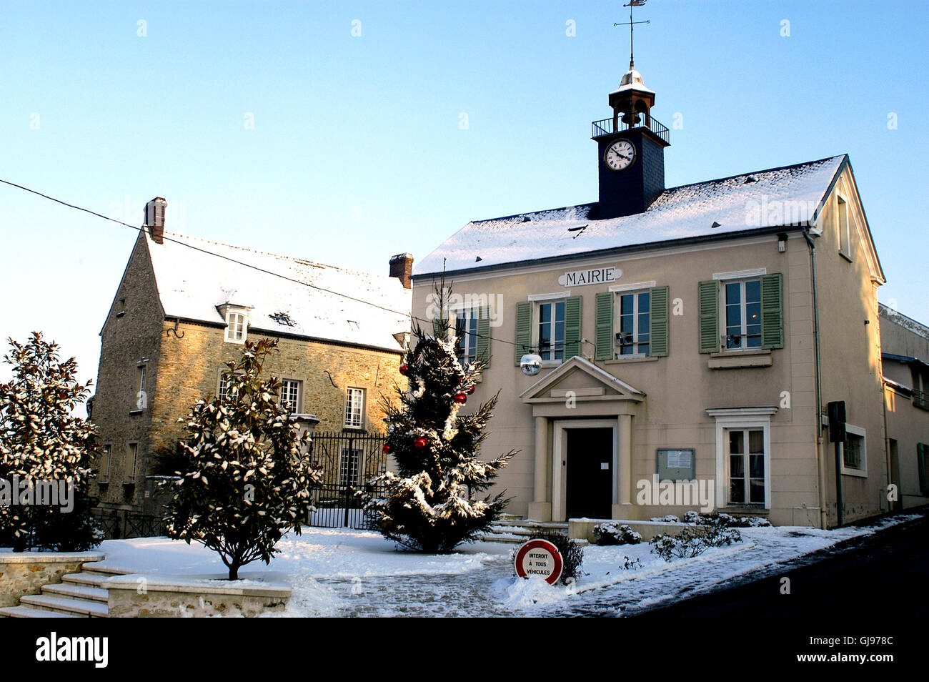 The mayor of the city of Thoiry under snow in Paris in the French department of Yvelines Stock Photo