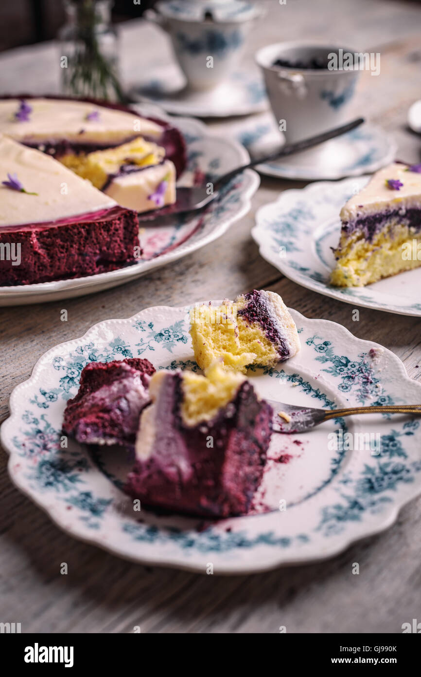 Slice of blueberry cake with whipped cream and mascarpone Stock Photo ...
