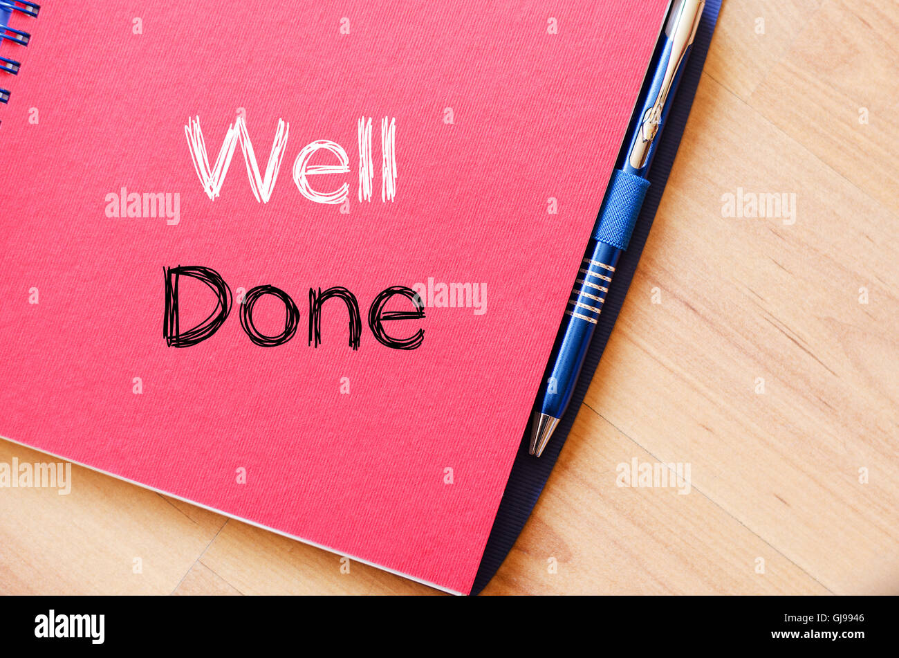 Well done text concept write on notebook Stock Photo