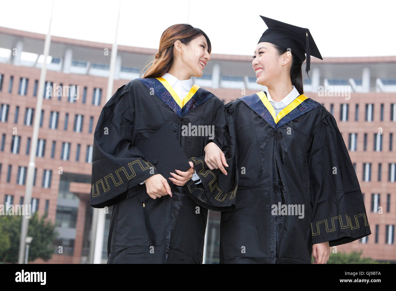 Young university student graduation ceremony on campus Stock Photo - Alamy