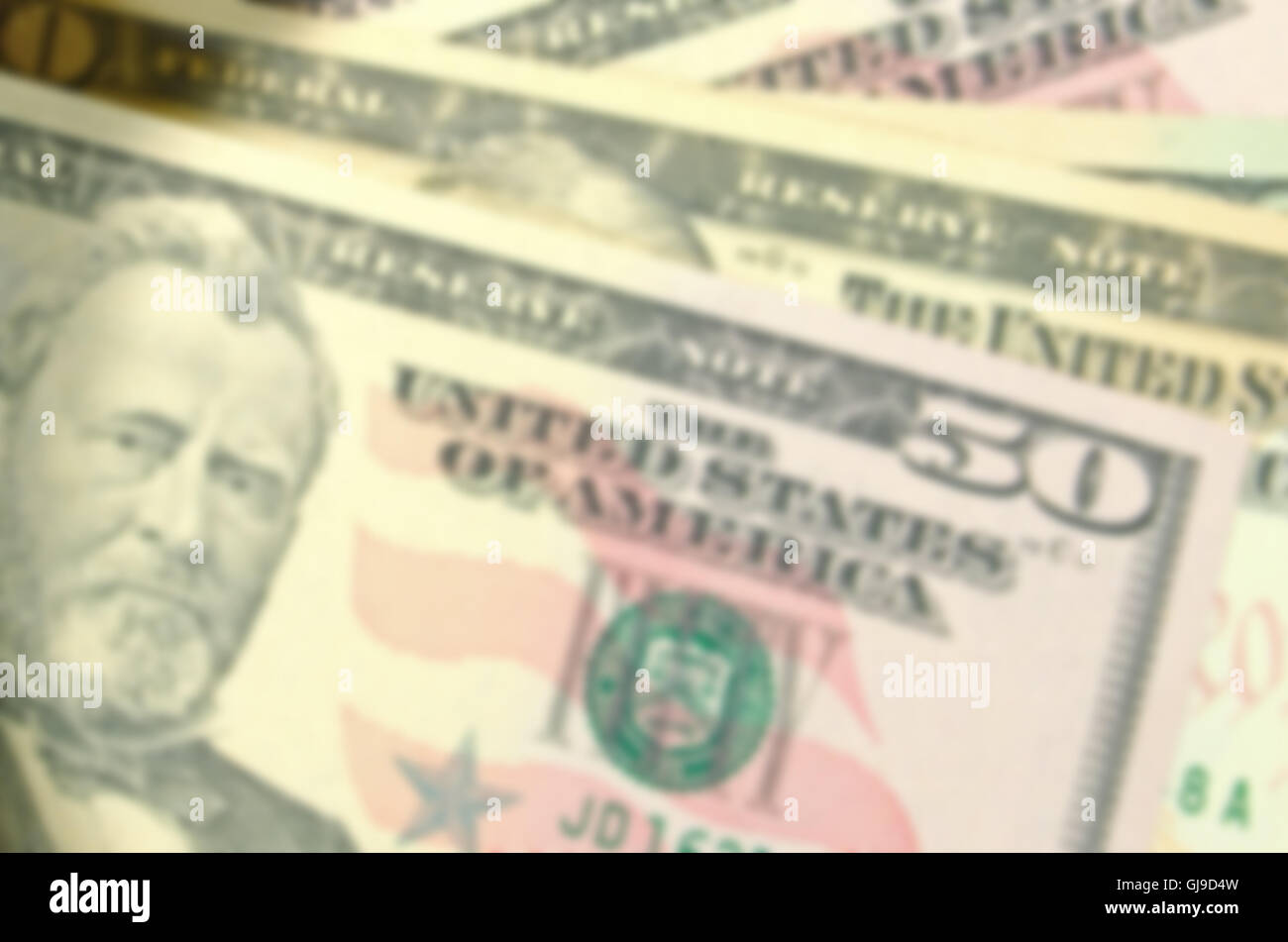 Blurred Dollars Banknote Background. Stock Photo