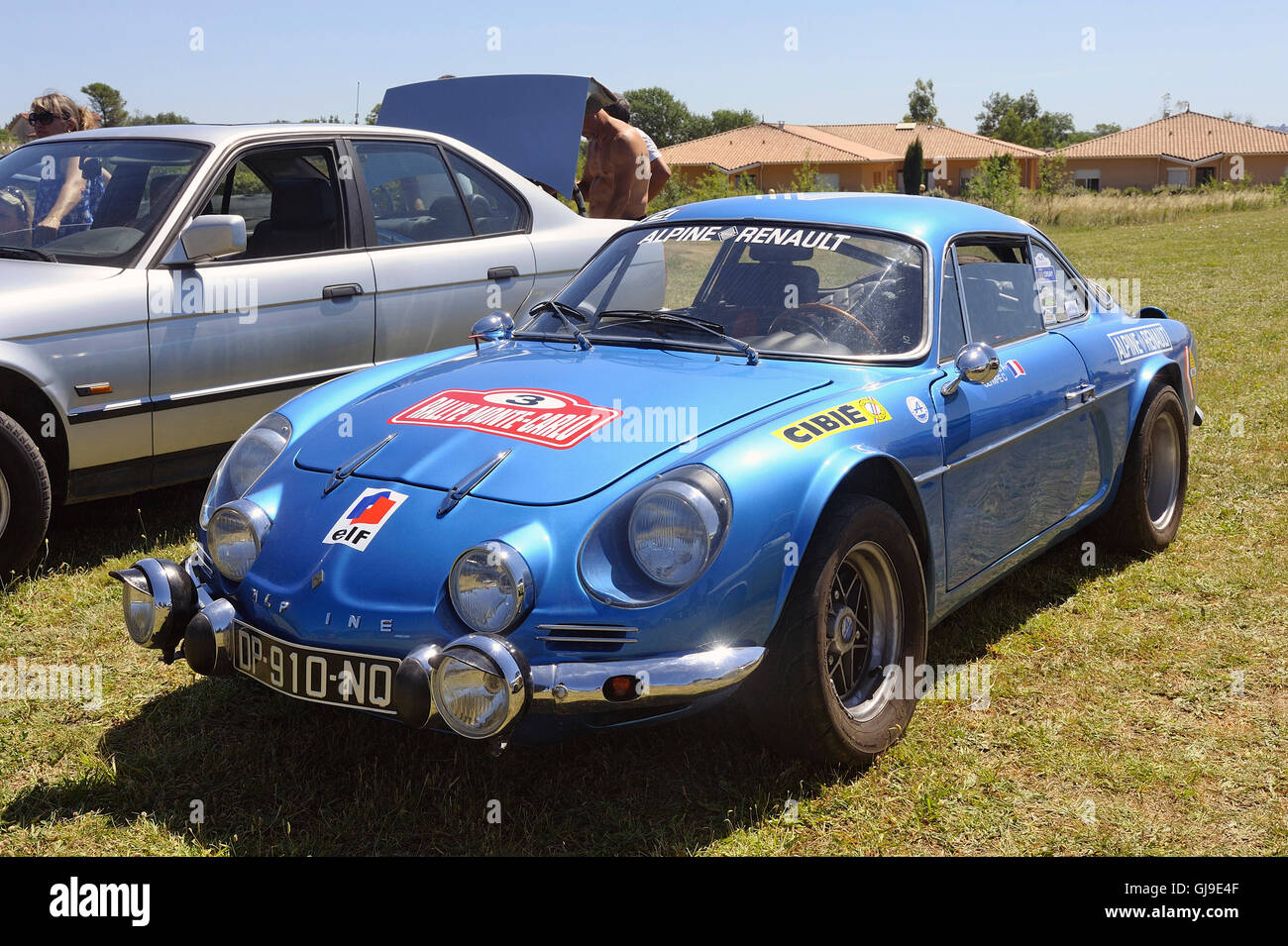 Alpine Renault equipped race exposed to a vintage car rally Stock Photo