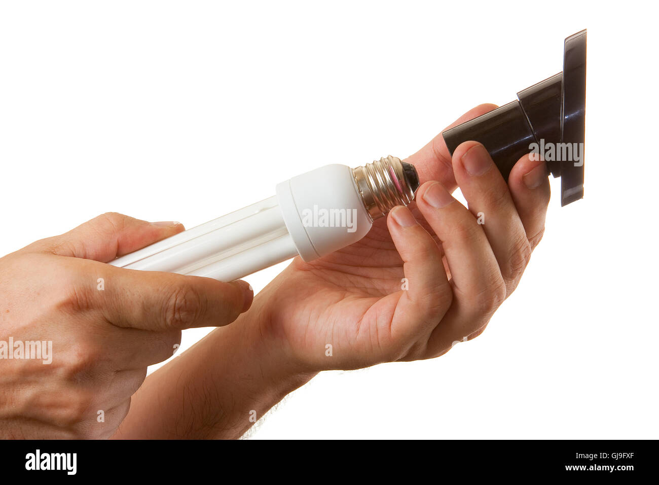 energy-saving lamp in hand Stock Photo