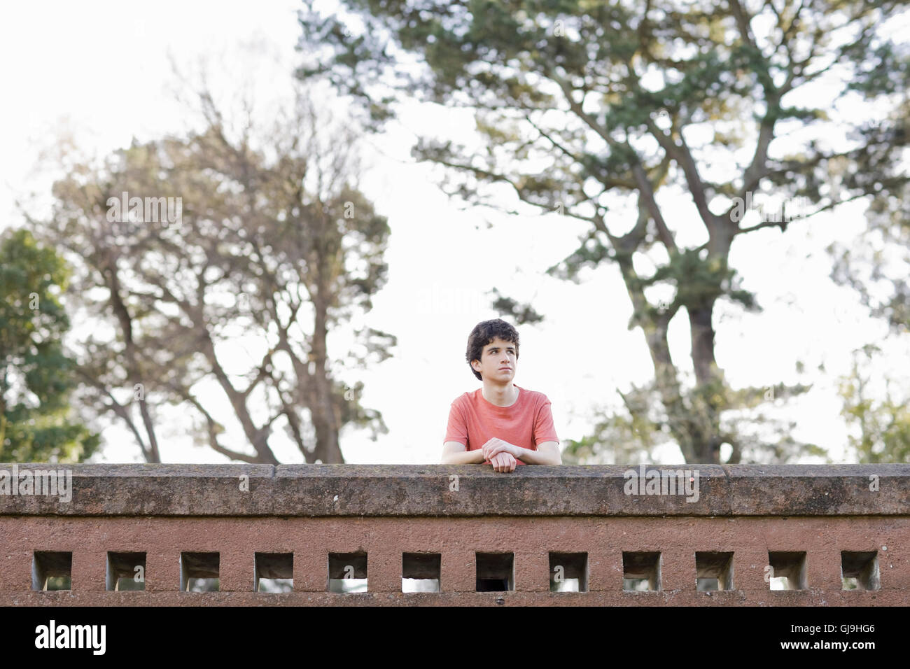 Teen Boy Outdoors Looking Away From Camera Stock Photo - Alamy