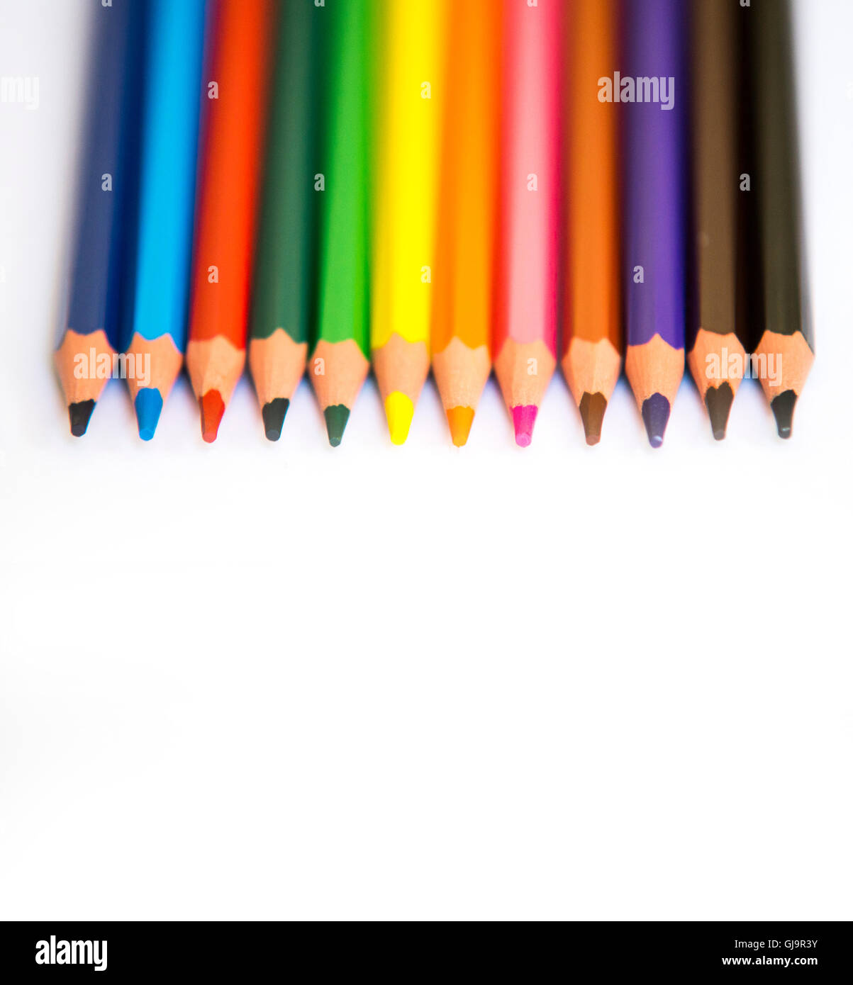 Colorful pencils isolated on a white paper background Stock Photo