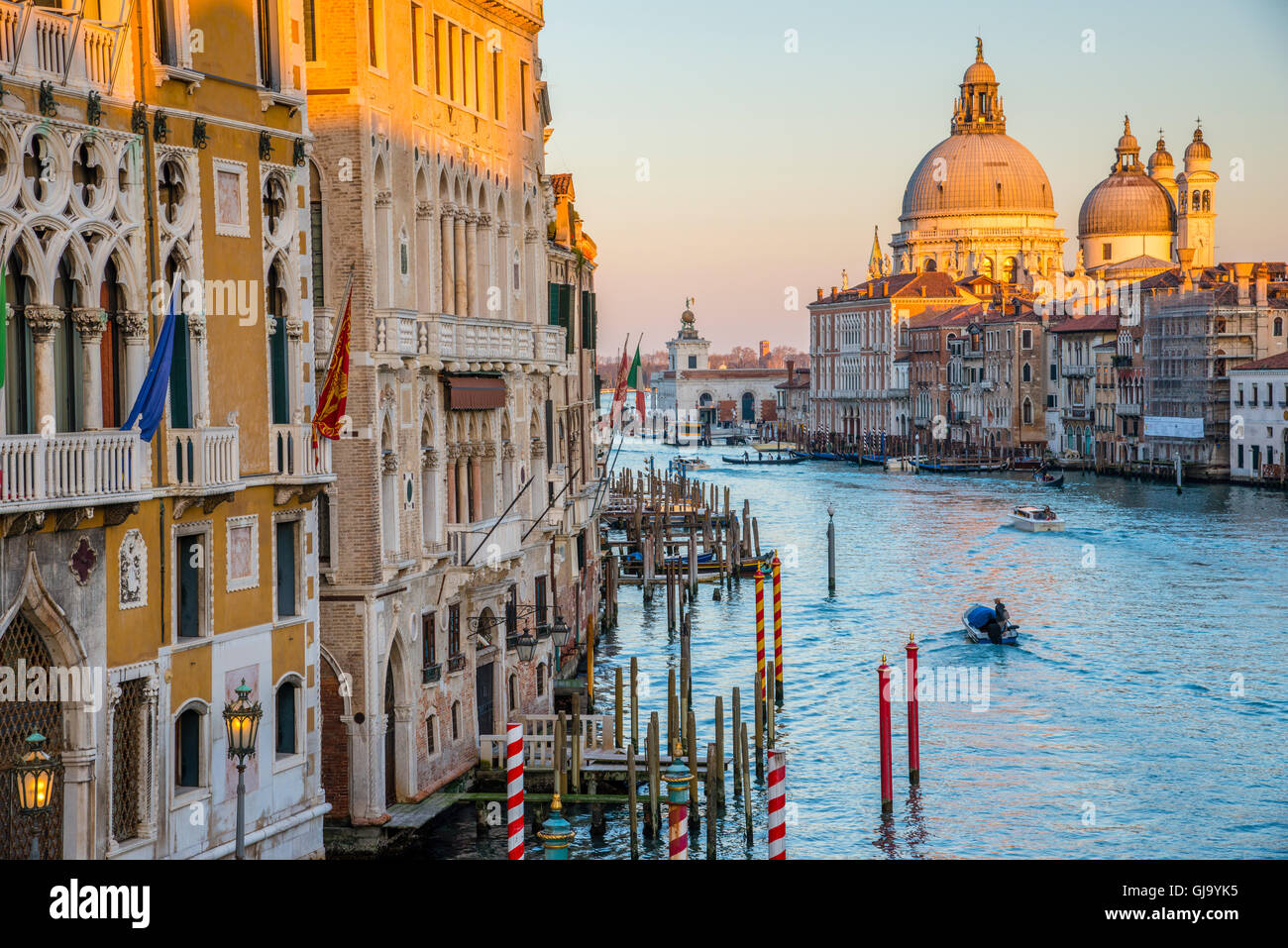 Dusk Scene of the Grand Canal in Venice, Italy with a view of the Santa Maria della Salute Basilica. Stock Photo