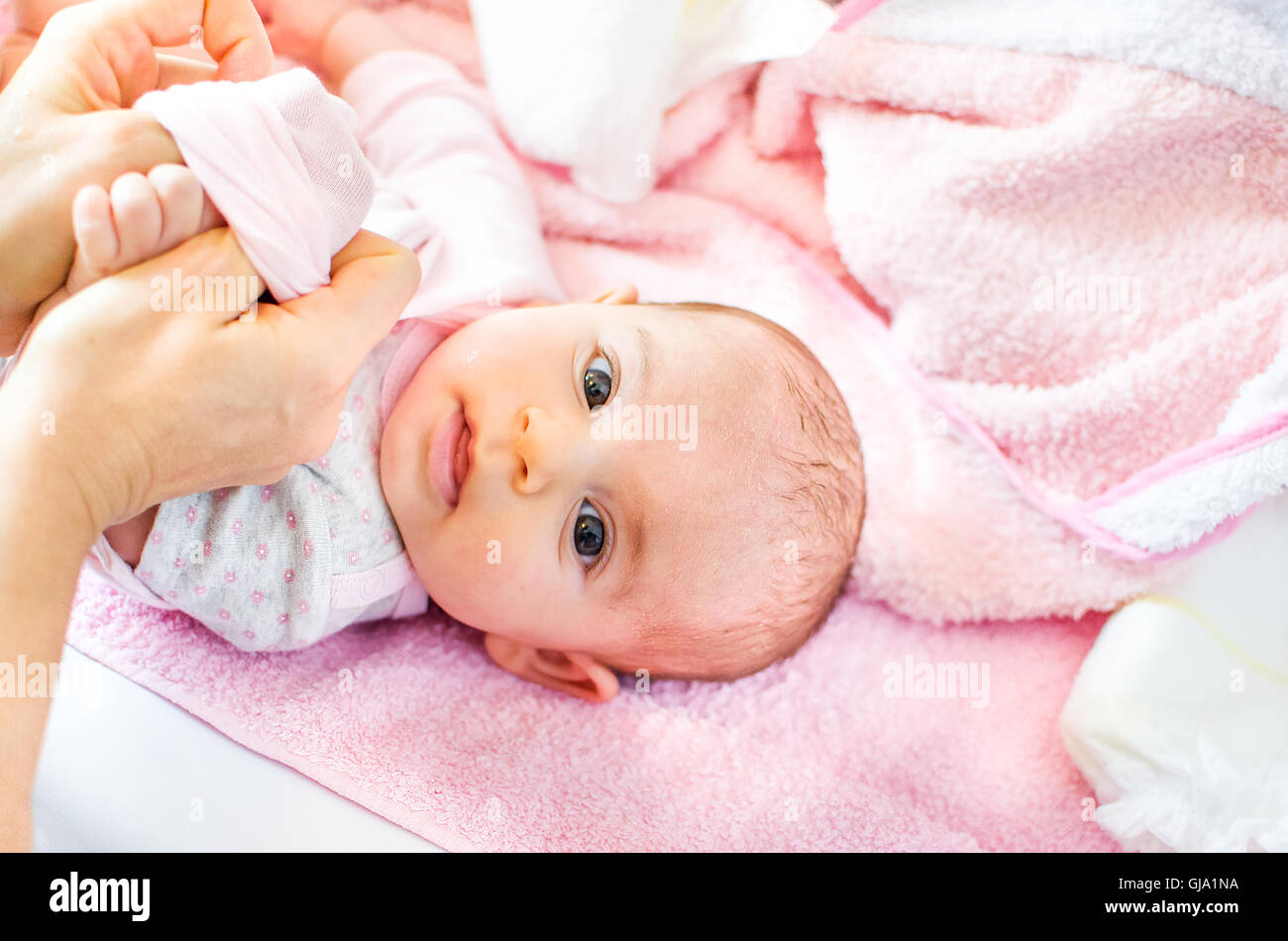 baby dressing pink Stock Photo Alamy