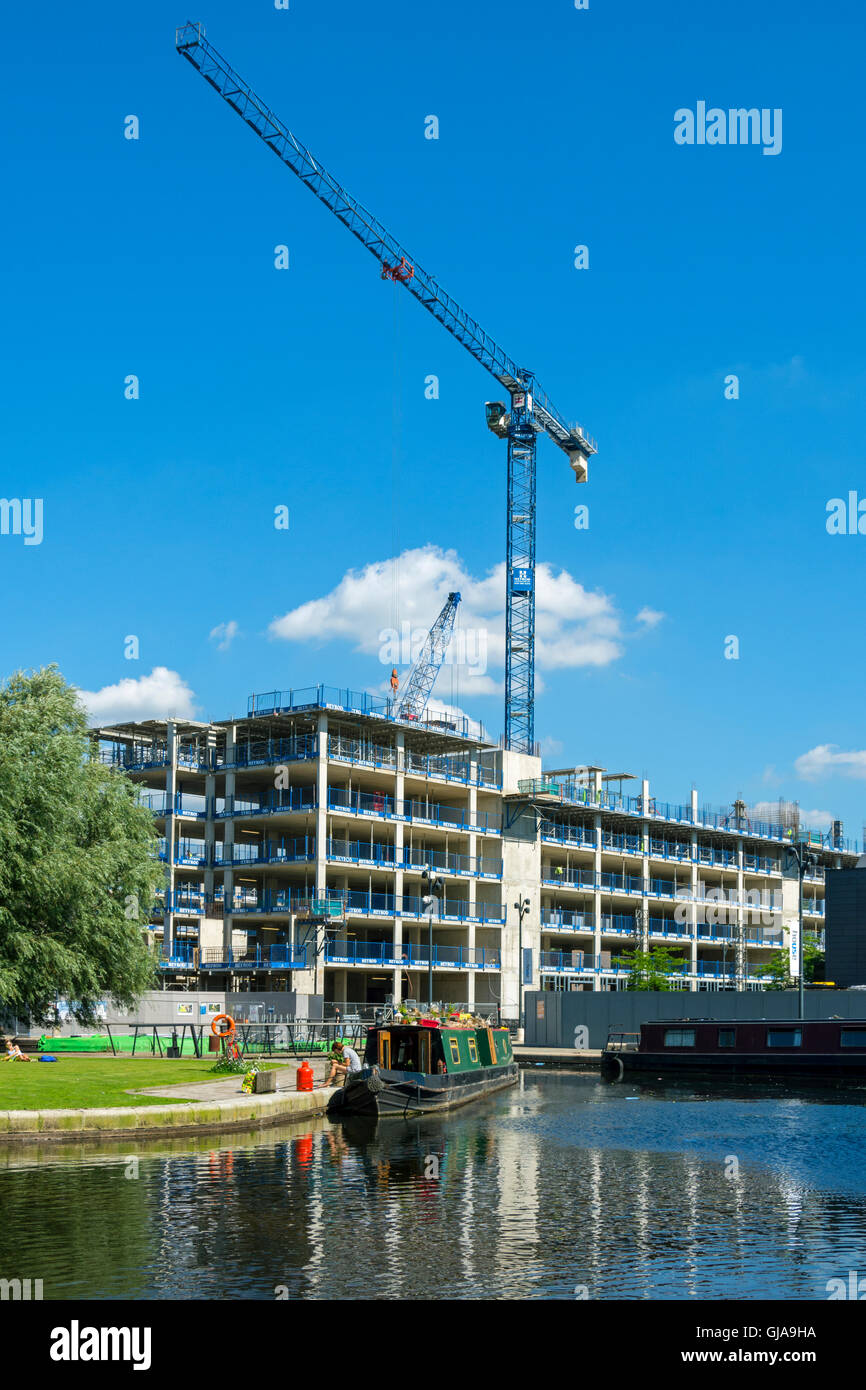 The 'Cotton Field Wharf' apartment blocks under construction from the Cotton Field Park marina