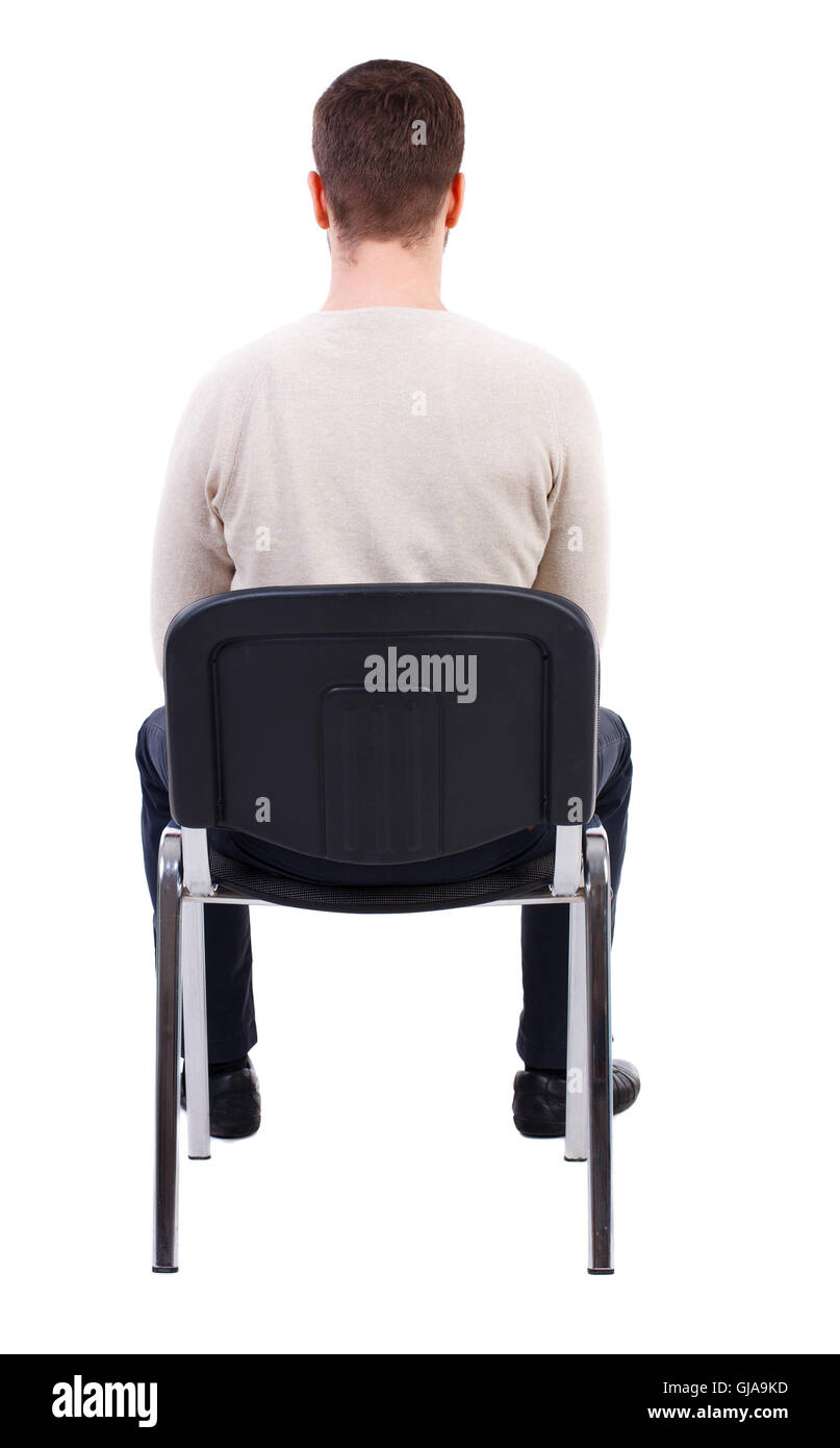 back view of business man sitting on chair Stock Photo Alamy